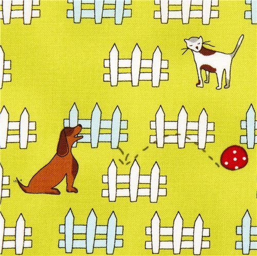 green designer fabric with dog cat fence ball